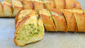 Herbal Infused Garlic Spread on French bread